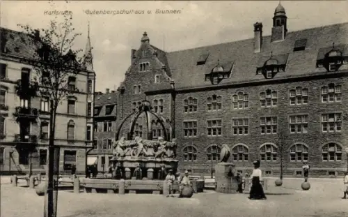 Ak Karlsruhe in Baden,  Gutenbergschulhaus, Brunnen