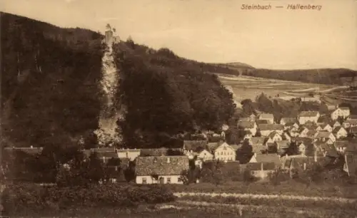Ak Steinbach Hallenberg im Thüringer Wald, Steinbach, Hallenberg, Dorfansicht, Felswand