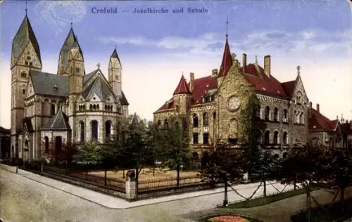 Ak Krefeld am Niederrhein, Josefkirche und Schule, Außenansicht