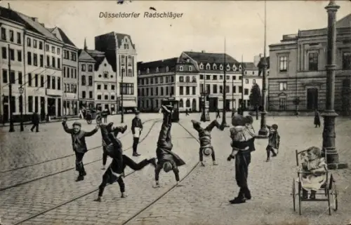 Ak Düsseldorf am Rhein, Düsseldorfer Radschläger auf der Straße