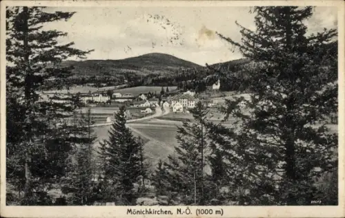 Ak Mönichkirchen in Niederösterreich, Blick durch Bäume, Dorf mit Kirche, Felder und Bauernhöfe, 
