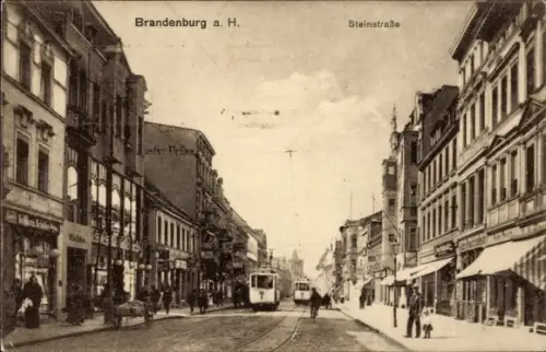 Ak Brandenburg an der Havel, Steinstraße, Geschäftshaus Gustav Urban, Straßenbahn