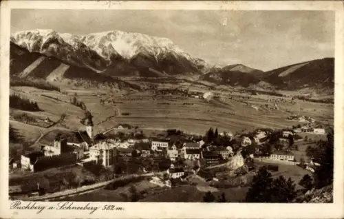 Ak Puchberg am Schneeberg Niederösterreich, Berglandschaft,  verschneite Berge, kleine Ortschaft