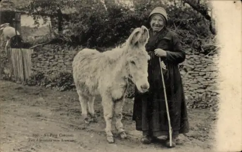 Ak Creuse, Frau in Tracht, Esel