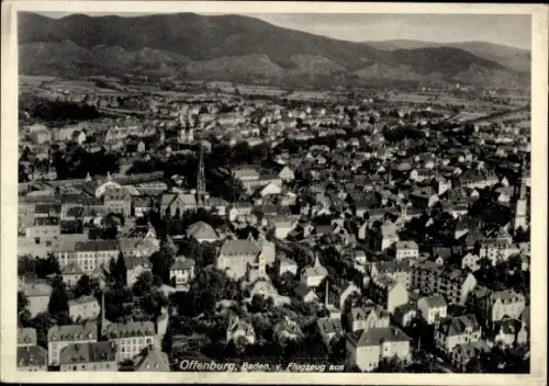 Ak Offenburg in Baden Schwarzwald, Luftaufnahme von  Baden, viele Häuser, Berge im Hintergrund