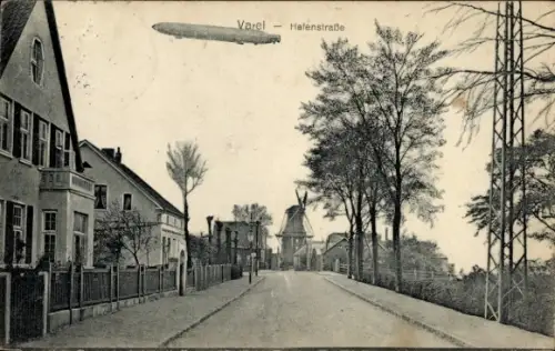 Ak Varel in Oldenburg Jadebusen, Hafenstraße, Windmühle, Zeppelin