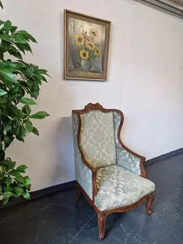 Antiker Ohrensessel neu gepolstert mit hochwertigem Stoff um 1900