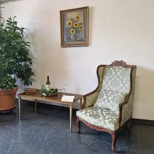 Antiker Ohrensessel neu gepolstert mit hochwertigem Stoff um 1900