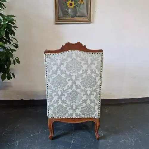 Antiker Ohrensessel neu gepolstert mit hochwertigem Stoff um 1900