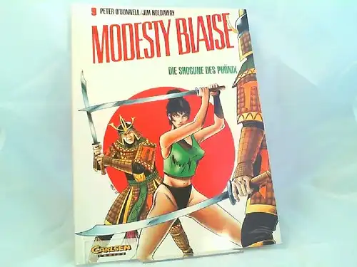 O`Donnell, Peter (Text) und Jim Holdaway (Zeichnungen): Modesty Blaise 9: Die Shogune des Phönix. [Carlsen Comics]