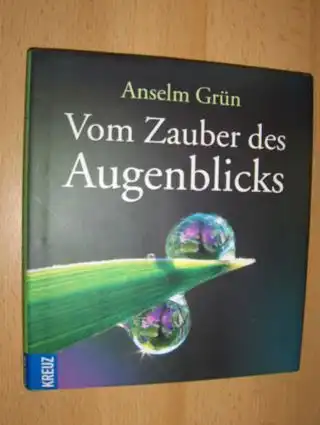 Grün, Anselm: Vom Zauber des Augenblicks. Mit Fotografien von Tina und Horst Herzig.