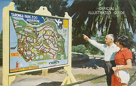 Official illustrated Guide (Visitors in front of Zoo Map). 