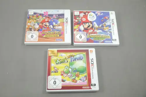 Nintendo 3DS 3 x  Hüllen mit Spielanleitung 2x  Mario 1x Yoshi ohne Spiel (K43)