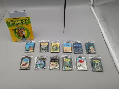 Tintin Tim & Struppi Schlüsselanhänger ca. 4 cm x 6 cm Album Motive