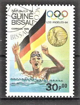 Briefmarke Guinea-Bissau Mi.Nr. 823 o Medaillengewinner Olympiade Los Angeles 1984 / Schwimmer Michael Groß