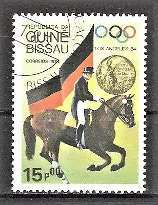Briefmarke Guinea-Bissau Mi.Nr. 820 o Medaillengewinner Olympiade Los Angeles 1984 / Dressurreiter Reiner Klimke