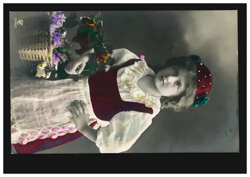 Enfants-AK Fille comme un petit chaperon rouge avec des fleurs, ZÜRICH 28.2.1911