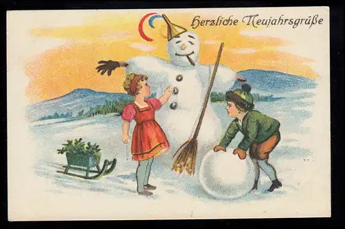 AK Neujahr: Mädchen und Junge bauen einen Schneemann, LEIPZIG 30.12.1932
