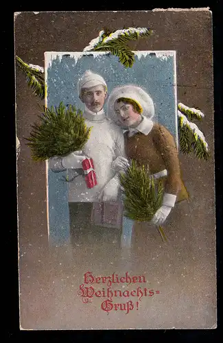 Photo AK Noël: Couple en vêtements d'hiver avec sapin vert GILDEHAUS 24.12.21