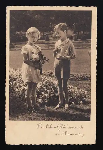 2 blonde Kinder mit Blumen im Park, Glückwunsch Namenstag Ybbs (Donau) 30.4.1941