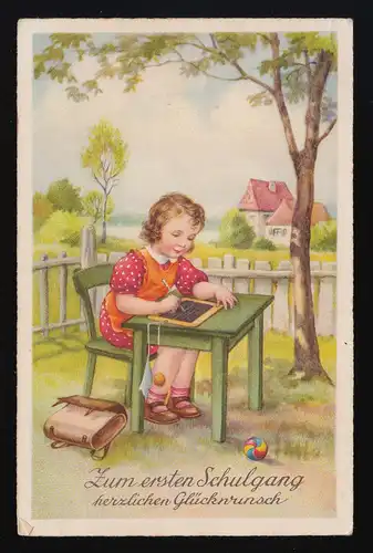 Fille assis sur le banc dans le jardin écrit sur la tablette d'ardoise, couru 27.3.1940