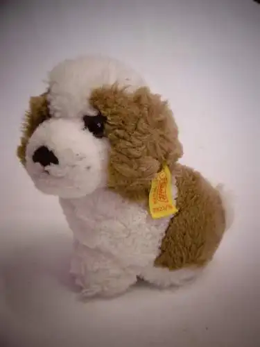 Vintage Plüschtier von STEIFF: "Kleiner Bernhardiner", mit Knopf und Fahne