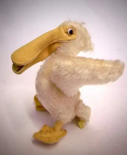 Vintage Plüschtier von STEIFF: "Pelikan Piccy", mit Knopf und Fahne