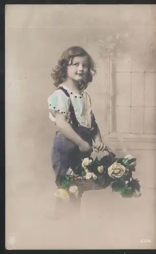 Little girl with basket of flowers, old postcard