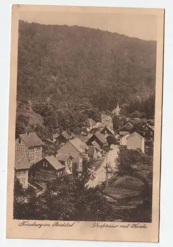 Roseburg im Bocketal Dorfstrasse mit Kirche.