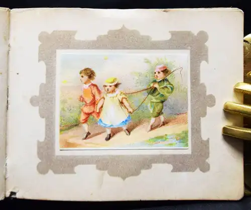 Puppenbilderbuch. 7 muntere Kinderscenen. Schreiber 1877 MINIATURBUCH