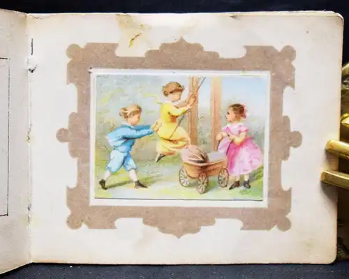 Puppenbilderbuch. 7 muntere Kinderscenen. Schreiber 1877 MINIATURBUCH