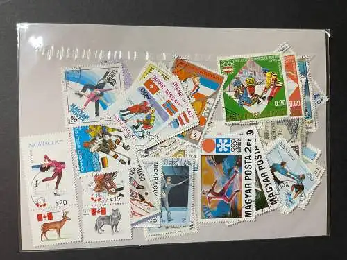 100 verschiedene Eissport Briefmarken, 100 different ice sports stamps 