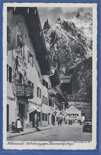 Alte AK Bayern Mittenwald Adlerhaus gegen Karwendelgebirge , gelaufen 1939