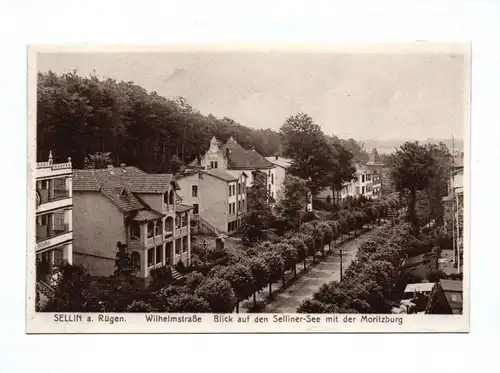 Ak Sellin auf Rügen Wilhelmstraße Blick auf den Selliner See mit der Moritzburg