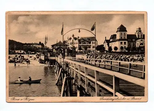 Ak Binz auf Rügen Landungsbrücke und Strand