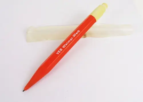Alter Reklame Kugelschreiber orange VEB Weimar Werk DDR Kuli Vintage