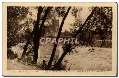 Mantes Cartes postales Un joli coin sur la Seine a l&#39arrire plan la cathedrale