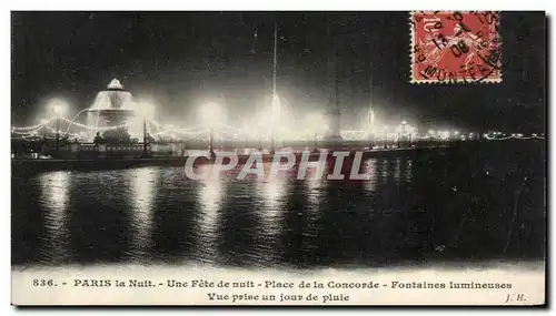 Cartes postales Paris La Nuit Une de nuit Place de la Concorde Fontaines Lumineuses Vue prise un Jour de Pluis