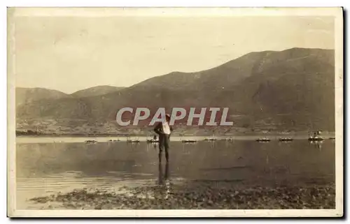CARTE PHOTO Homme a la plage