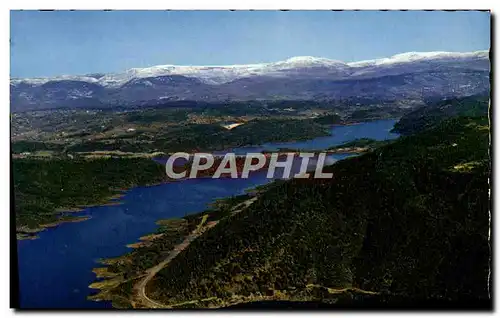 Cartes postales moderne Pres de Cannes et la Grasse le Lac de St Cassien Les Alpes enneigees