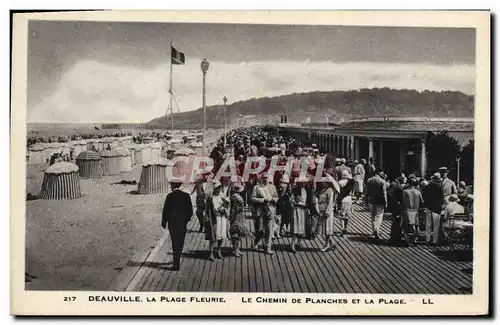 Ansichtskarte AK Deauville La plage fleurie Le chemin de planches et la plage