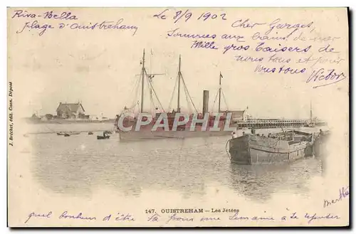 Ansichtskarte AK Ouistreham Les jetees Bateaux