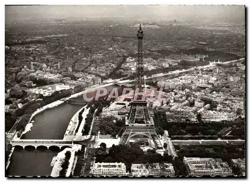 Cartes postales moderne Avion Au Dessus De Paris La Tour Eiffel