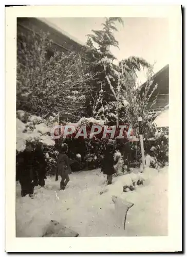 Photo Enfant bataille de boules de neige