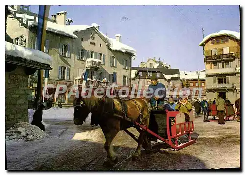 Cartes postales moderne Megeve La Place De I'Eglise Et les traineaux