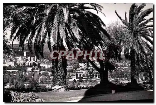 Ansichtskarte AK Grasse Vue generale sur la Ville a travers les palmiers