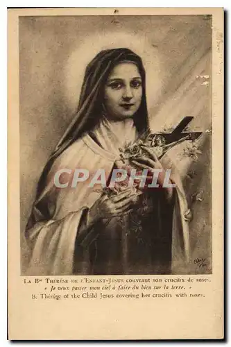 Cartes postales La Bte Therese de l'Enfant Jesus couvrant son crucifix de roses