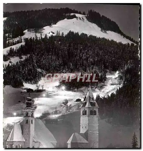 Cartes postales moderne Kitzbuhel Tirol bei Nacht mit beleuchteter Ganslern Abfahrts Piste