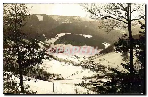 Photo village sous la neige