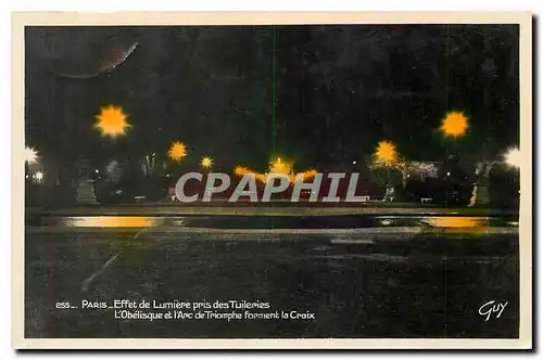 Cartes postales Paris Effet de Lumiere des Tuileries l'Obelisque et l'Arc de Triomphe forment la Croix